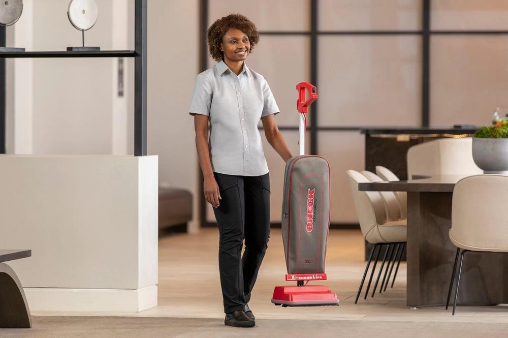 Oreck 9lb Commercial Upright vacuum. Red basecord