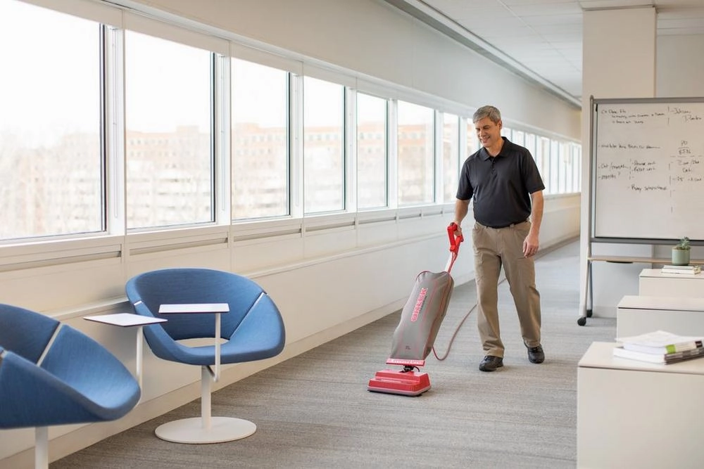 Oreck 9lb Commercial Upright vacuum. Red basecord